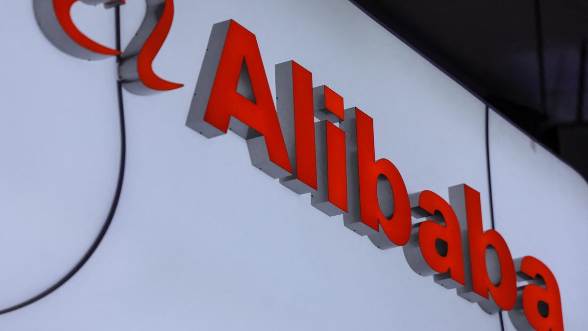 An Alibaba booth at a Chinese technology trade expo, with the company's logo above a display floor.