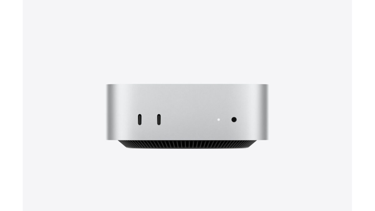 Apple Mac mini desktop computer on a clean background, showing the M4-era chassis.