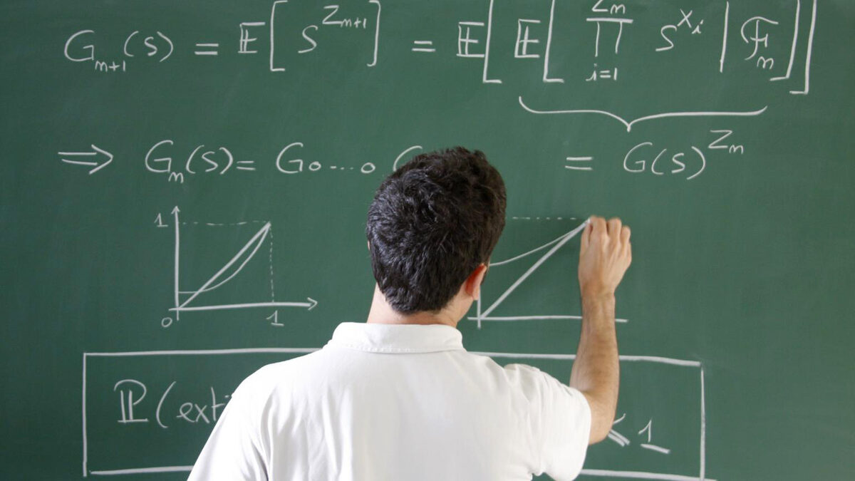 A mathematics lecture hall with equations on blackboards
