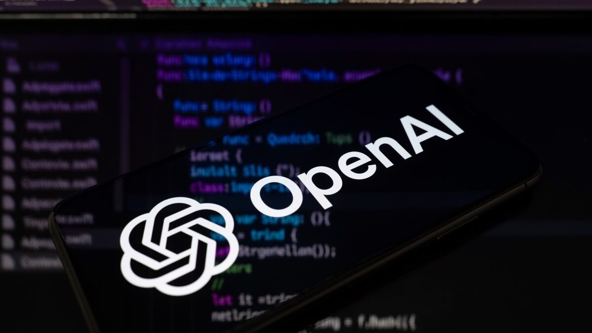 OpenAI's Codex branding over a code background, illustrating Codex expanding across the ChatGPT app.