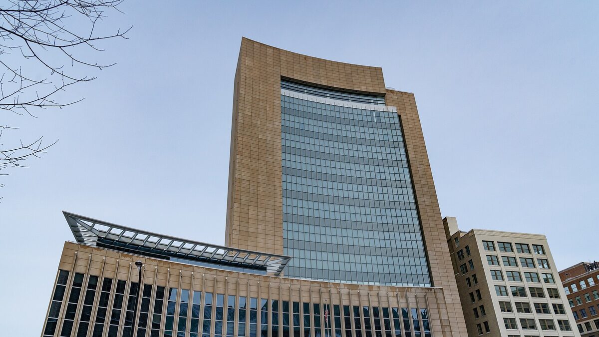 The Minneapolis federal courthouse, home of the U.S. District Court for the District of Minnesota, photographed from below against a pale sky.