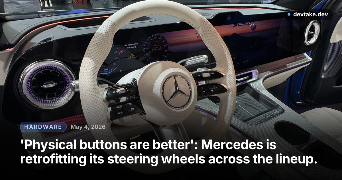 Interior of a Mercedes-Benz GLC showing the redesigned steering wheel with physical rocker switches and rollers next to the wide curved Hyperscreen dashboard display.